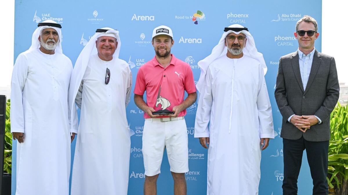 Pictured L-R: Ismail Sharif, Regional Director, Dubai Golf, Walid Al Attar Board Member, Emirates Golf Federation, UAE Challenge winner, Rasmus Neergaard-Petersen, His Excellency Aref Hamad Al Awani, General Secretary, Abu Dhabi Sports Council and Tom Phillips, Head of Middle East, European Tour Group. - Supplied photo